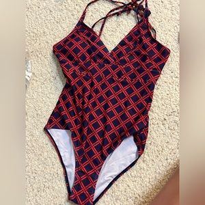 Swim suit - never worn.  Ordered wrong size and can’t return.  From gracesunny